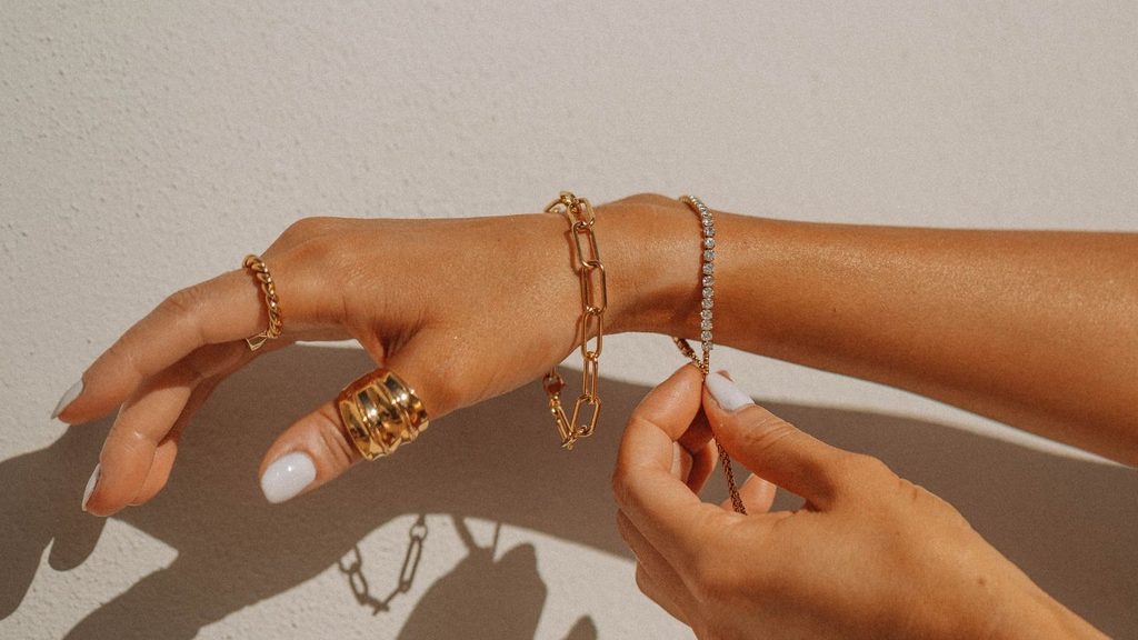 Hands wearing rings 